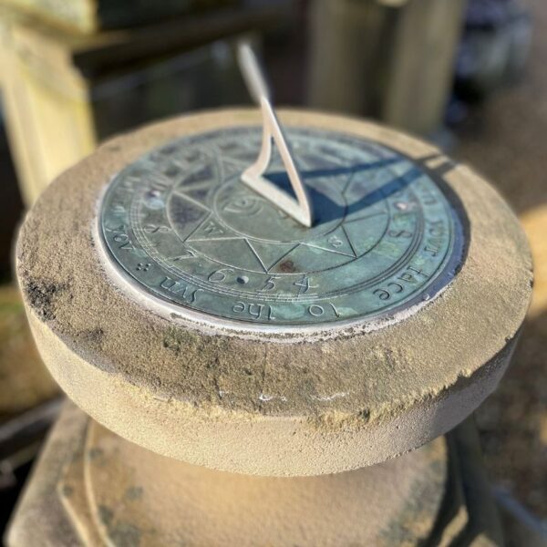 Hand carved stone sundial
