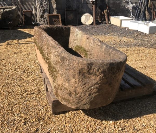Gritstone trough with rounded ends