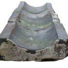 Weathered blue gully bricks, ready for installation as irrigation or drainage system
