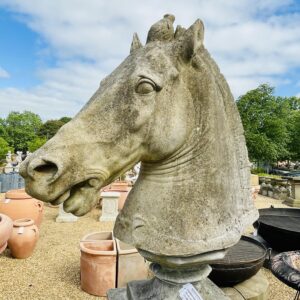 Stone horse head statue