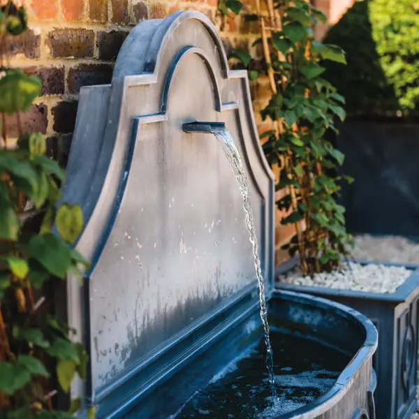 Relax against the sound of gently tumbling water with this stylish zinc water feature. The sound of water has long been known for its therapeutic qualities and has been proven to help us wind down and tune out from everyday distractions. This water feature from the highly sought after A Place in the Garden, recycles its water and does not need a water supply, so you have full control over where you would like to place it! Please note that this product could take up to a few weeks to deliver. Complete your order and we will get in touch to arrange a delivery date with you. Photos courtesy of A Place In The Garden  You can read our delivery terms and conditions here.