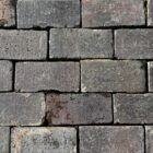 Staffordshire Blue paving bricks showing smooth worn faces and weathered patina, recovered from a large garden near Tiffield, Northamptonshire
