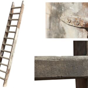 An antique wooden loft ladder with mortice and tenon joints and a fabulous patina that shows true character