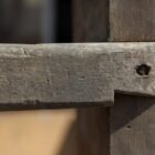 Detail of the mortice and tenon joint on this antique wooden loft ladder with a fabulous patina that shows true character