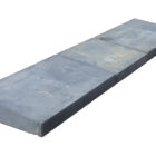 Blue/Grey concrete wall coping showing the fine, slate-like appearance and mild weathering from years in storage.