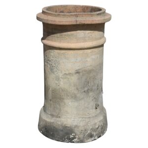A reclaimed buff, banded chimney pot showing a weathered patina of soot, environmental discolouration and a crack at the base.