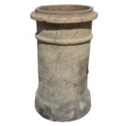 A reclaimed buff, banded chimney pot showing marvellous patina of age related stains and cracks.