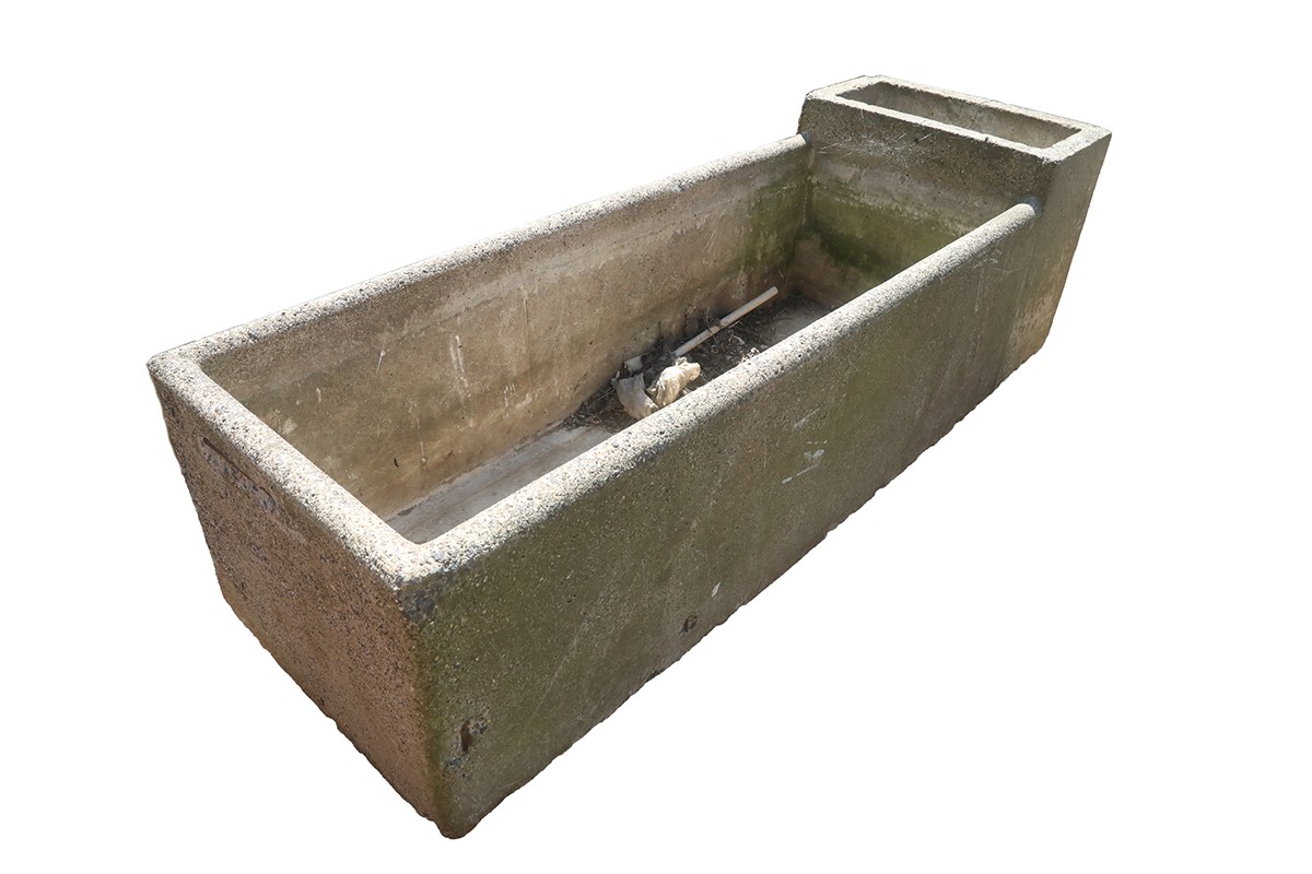 Concrete Cattle Trough and Cistern showing its brutalist design, softened by a weathered patina developed over decades exposed to the elements 5 GFO-0356