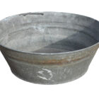Small galvanised metal tub or planter with aged patina and signs of previous use