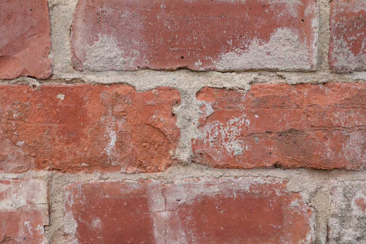 Detail of bricks bonded with lime mortar in a rustic style in keeping with surrounding buildings