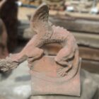 Side view of Pair of Dragon Roof Finials showing their dynamic crouching pose Terracotta 4 ROOF-0363