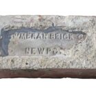 A detail of the reclaimed red plinth stretcher bricks from Cwmbran Brick Co.
