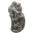 A reclaimed statue of Romeo and Juliet with a fine weathered patina of lichen and moss