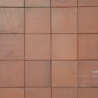 Reclaimed red 6 inch Ruabon quarry tiles showing mild weathering and a rich terracotta colour