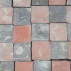 Red and Blue Quarry Tiles showing a worn patina and the remnants of mortar 1 RPAV-0144