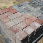 Red and Blue Quarry Tiles showing a worn patina and the remnants of mortar 2 RPAV-0144