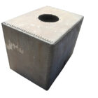 A reclaimed galvanised and riveted water tank showing a light weathered patina