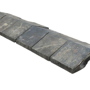 A short run of Staffordshire Blue square edge saddleback wall copings, showing light weathering despite use on a roof parapet since the late 1800's.