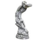 A heavily weathered birdbath depicting a cherub holding a shell, with a fabulous aged patina