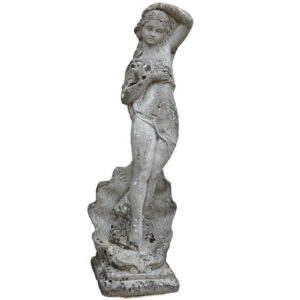 A classic statue of Venus with a weathered patina
