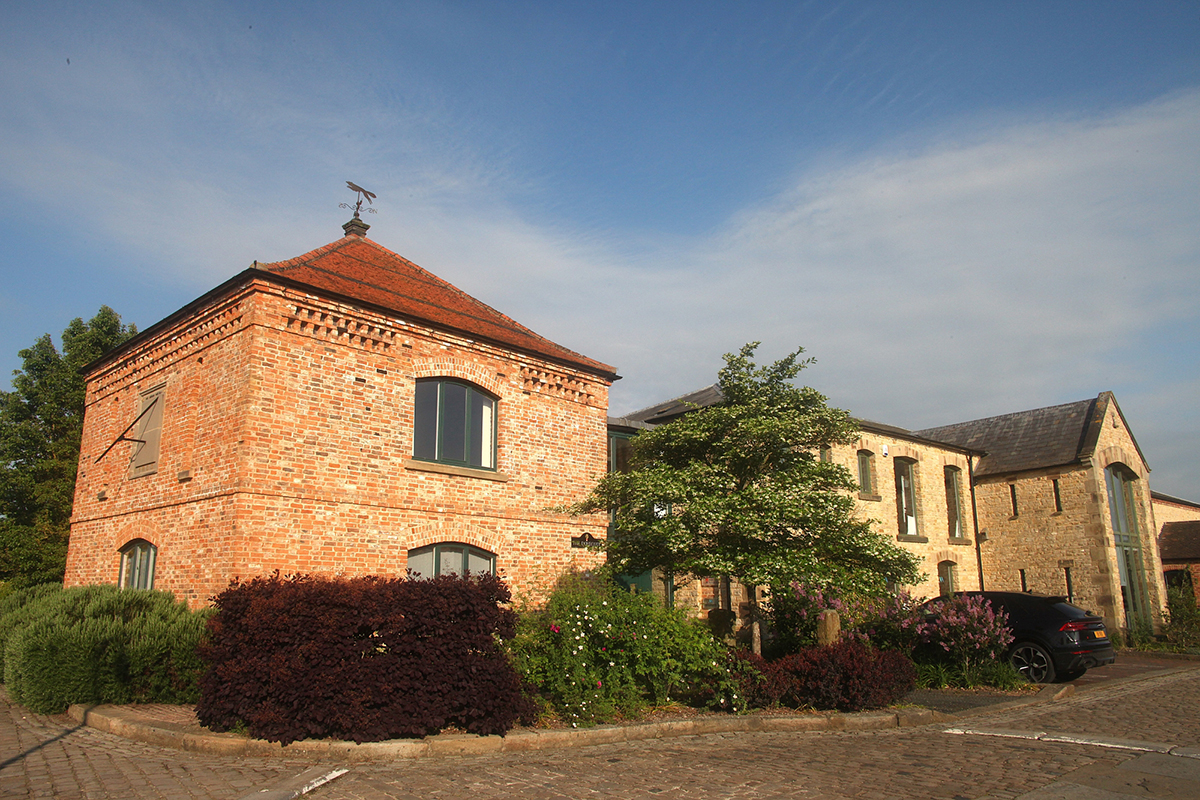 Architect designed and built with materials from reclamation yards, subsequently finished by sustainably focused landscapers