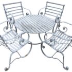 The zinc plated coffee table set with 4 chairs, showing the elegant scrollwork and relaxed attitude.
