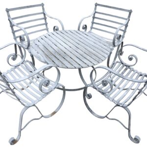 The zinc plated coffee table set with 4 chairs, showing the elegant scrollwork and relaxed attitude.