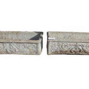 A pair of weathered composite stone balcony pots with a fine, light patina