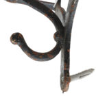 A detail of a weathered antique duck billed saddle rack, one of the most enduring tack rest designs across the UK