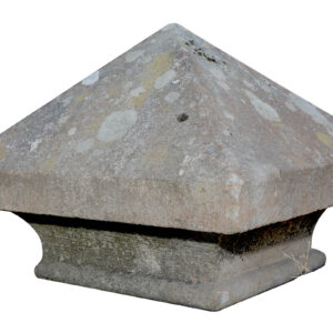 A weathered raised Yorkstone pier cap with patches of lichen and aged patina