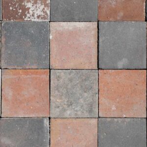 Reclaimed red and blue 6" quarry tiles showing an aged patina that offers a rustic aesthetic
