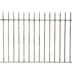 A section of reclaimed spike top wrought iron railings showing a weathered patina