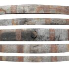 Reclaimed weathered whisky barrel staves showing the individual sizes and aged patina