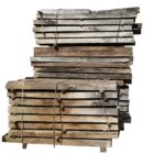 A batch of seasoned unused oak sleepers showing the patina of their age and years of seasoning