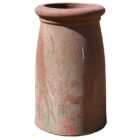 A reclaimed terracotta pepper pot chimney pot with a rolled rim and visible weathering