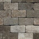 Reclaimed and weathered blue buff limestone setts showing tumbled and worn edges and a fabulous patina