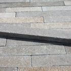 A 600mm Egyptian limestone cobble in a Dijon colour and with tumbled and etched surface that has been pre-sealed for internal or external durability.