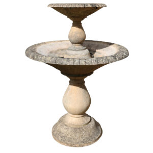 A weathered reclaimed Haddonstone Arcadian Double fountain showing the aged patina of long years spent exposed to the British weather