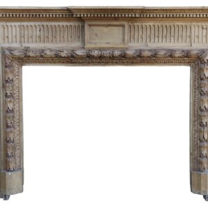 A 19th century hand carved fire surround with highly detailed design motifs and burnished pine finish
