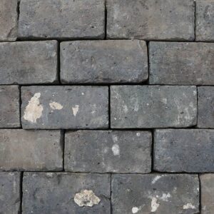 A batch of handmade Staffordshire Blue Pavers, a standard 9 inch brick, but with a trademark of the Star of David with a W in the centre, marking these as made by P & S Wood around 1890