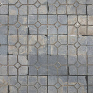 Unusual reclaimed patterned Staffordshire Blue pavers showing the weathered patina of age and prior use