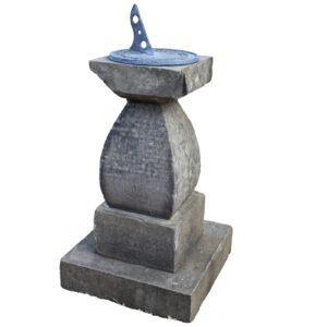 A heavily weathered reclaimed Yorkstone and lead sundial showing a beautiful aged patina