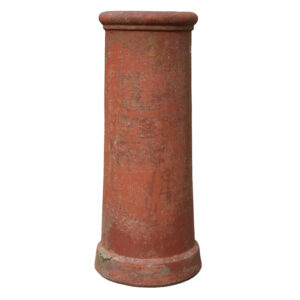 A lightly weathered red roll top chimney pot with fabulous patina
