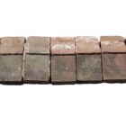 Reclaimed red handmade single sill bricks with a weathered patina