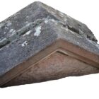 A pair of beautifully weathered sandstone apex pier caps showing a fine aged patina