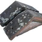 A pair of beautifully weathered sandstone apex pier caps showing a fine aged patina
