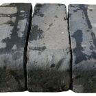Unusual Staffordshire blue parapet copings or steps with a single bullnose edge and showing signs of age and prior use in a superb patina