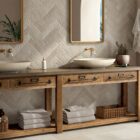 Interior wall use of Spanish porcelain tiles in a herringbone pattern and showing the Taxos Sand finish that accurately emulates Egyptian limestone.