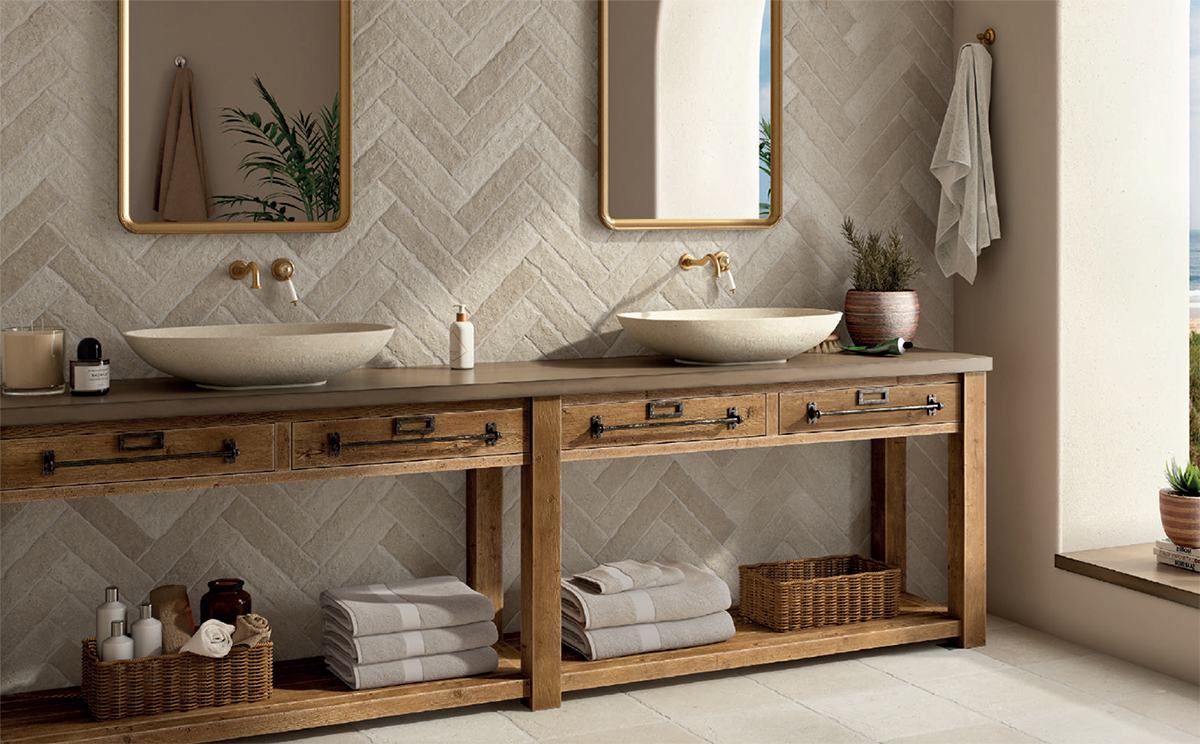 Interior wall use of Spanish porcelain tiles in a herringbone pattern and showing the Taxos Sand finish that accurately emulates Egyptian limestone.
