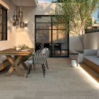 This tumbled Spanish porcelain paving brings a warmth and comfort to interior floors with the Juliette Piedra colourway and tumbled finish
